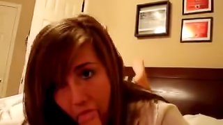Amazing Brunette Blows a Cock in a Raunchy Video