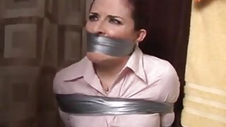 Curvy Housewife mouth packed and taped