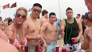 Alluring cowgirl in glasses getting drunk at the beach party outdoor